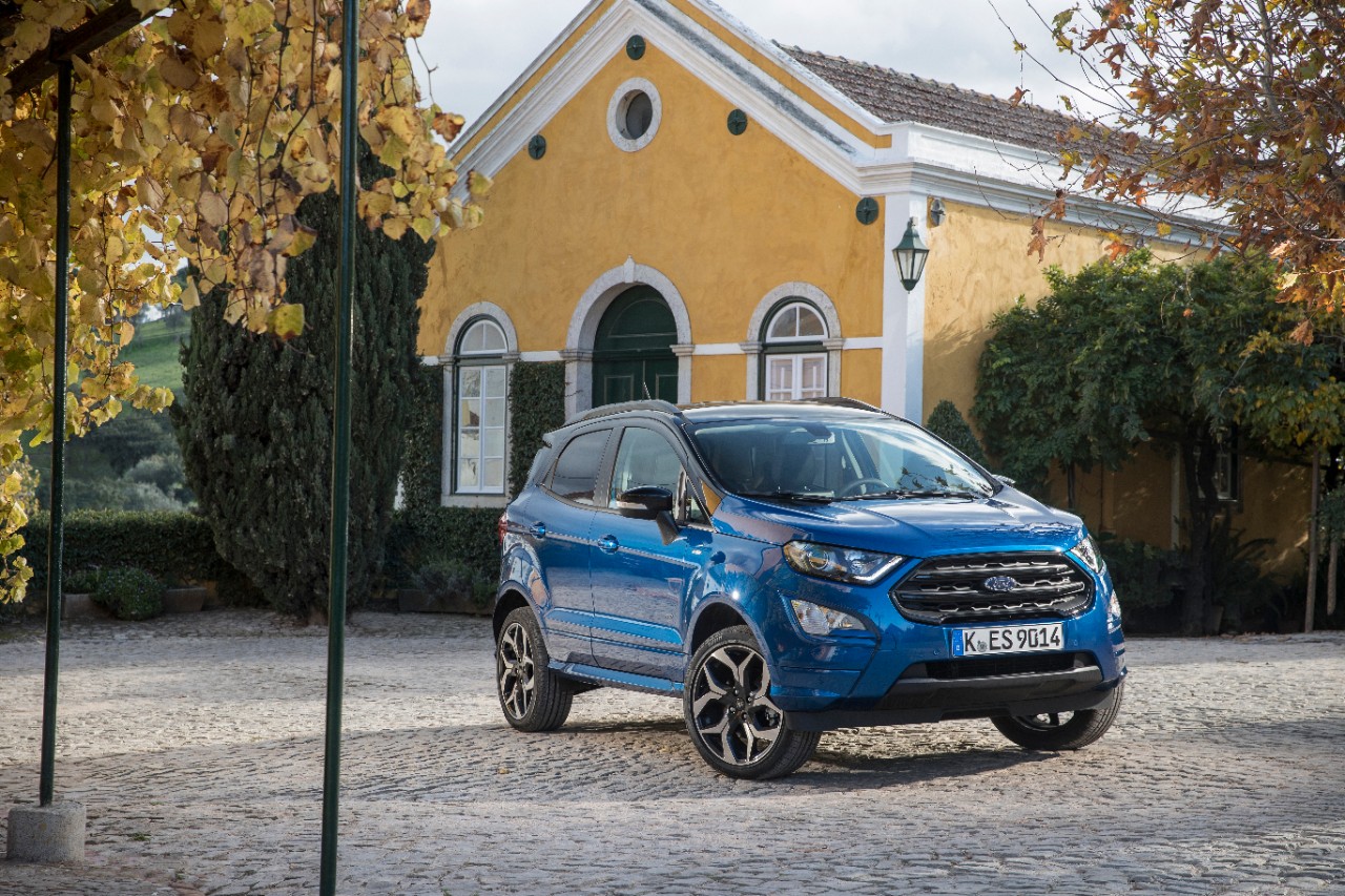 Ford's EcoSport parked in front of a home.