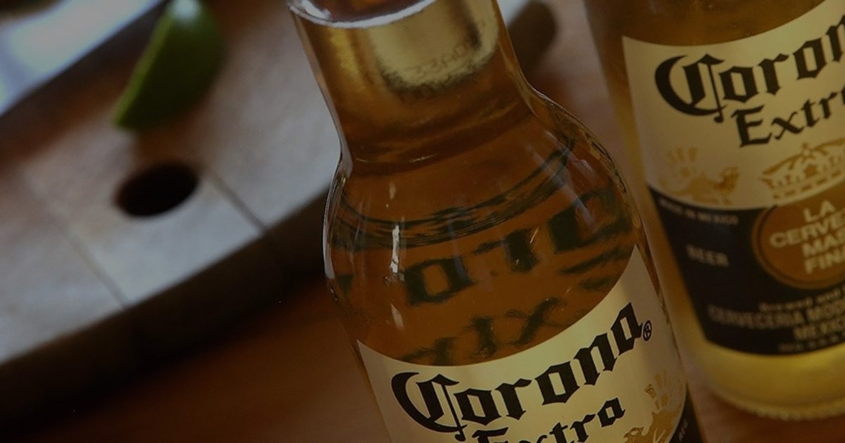 Two Corona bottles close up.