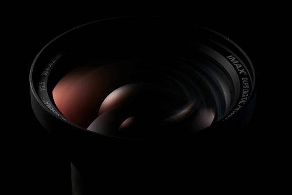 A camera lens with the IMAX logo on the edge.