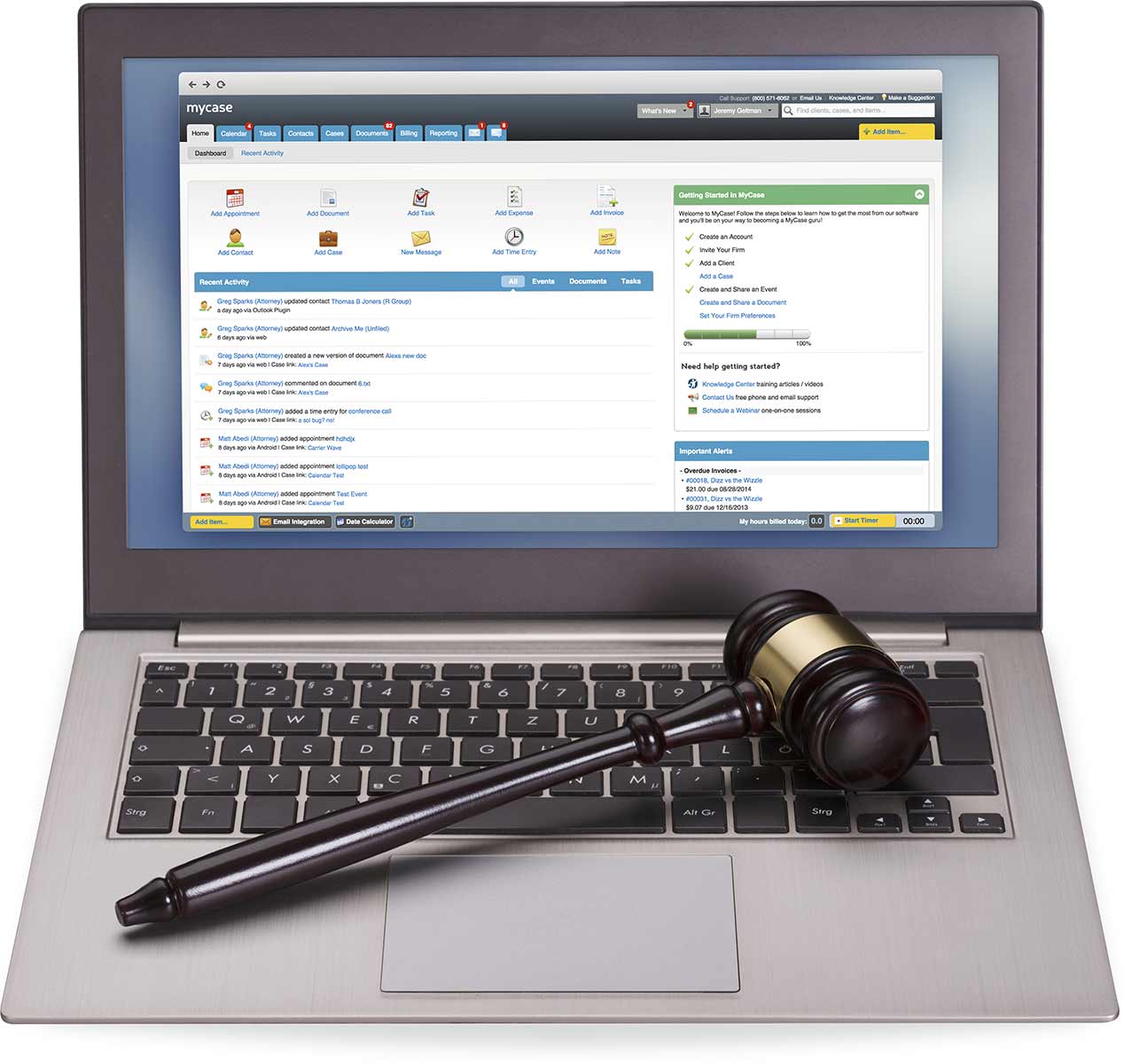 A laptop with AppFolio software running. A gavel sits on the keyboard.