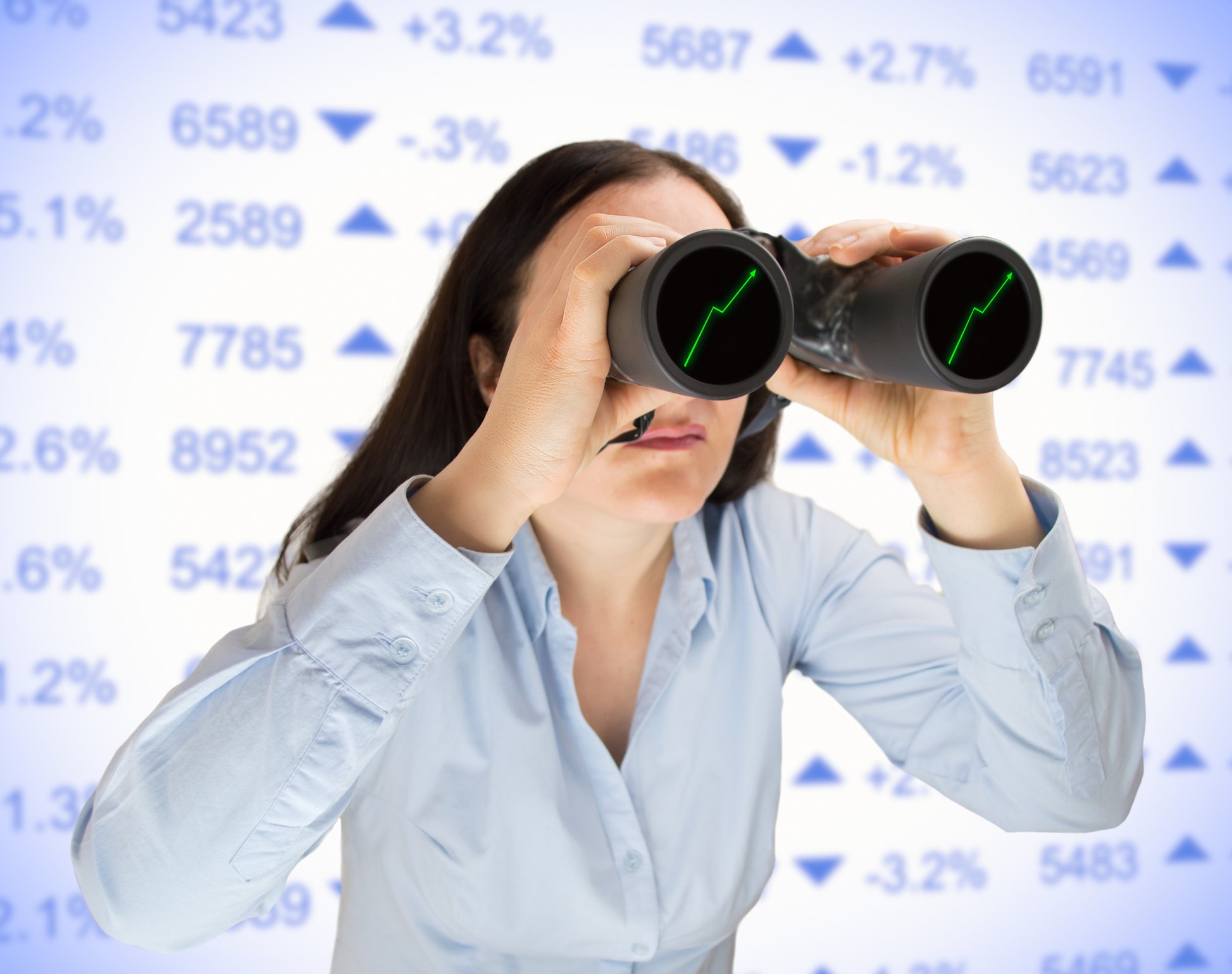 Investor looking through binoculars.