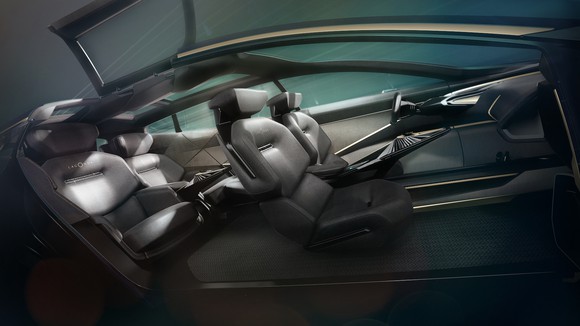A view of the Lagonda All-Terrain Concept's interior, showing plush seating for four and a futuristic-looking dashboard.
