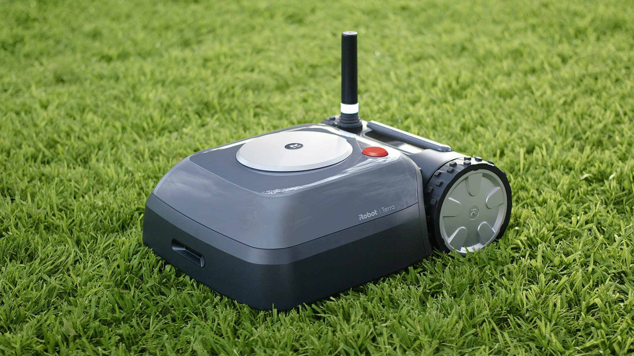 iRobot's new Terra Lawn mower on top of green grass