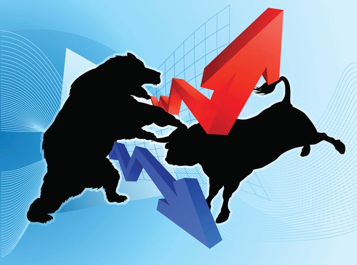 A drawing of a bull and a bear fighting.