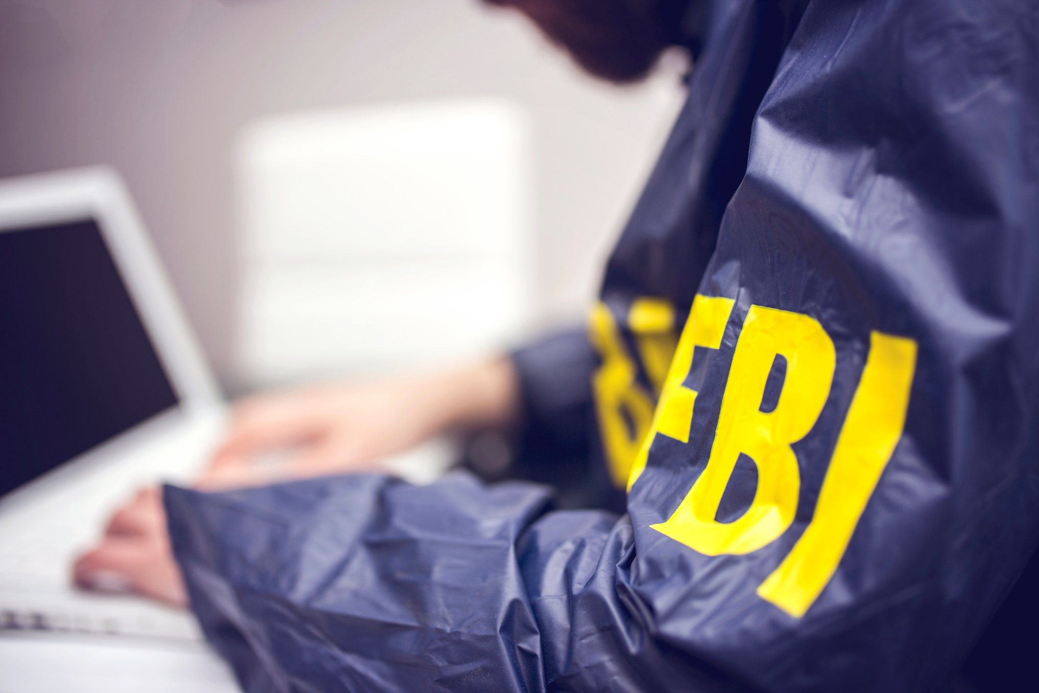 FBI agent at a computer