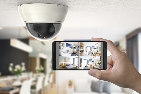 A smart home security camera system pictured inside a house.