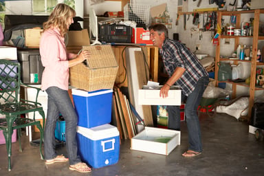 couple in cluttered garage_GettyImages-171588280