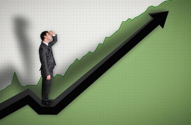Man watching chart go up