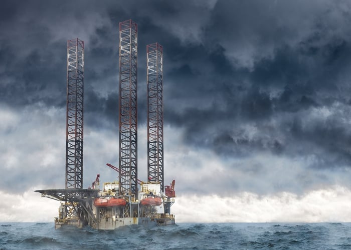 Jack up offshore rig in rough seas. 