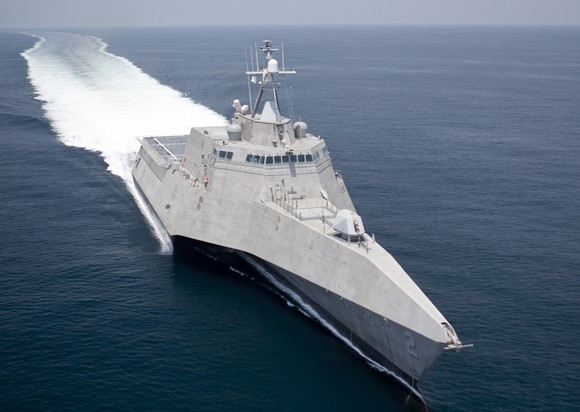 The USS Independence cuts through the water.