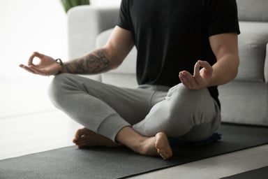 man practicing yoga