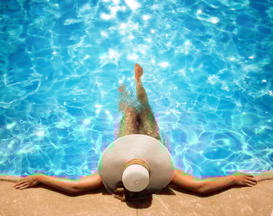 Getty Woman Relaxing in Pool