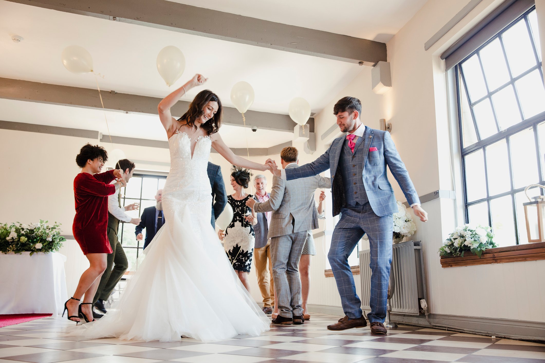 A bride and groom dance at a wedding