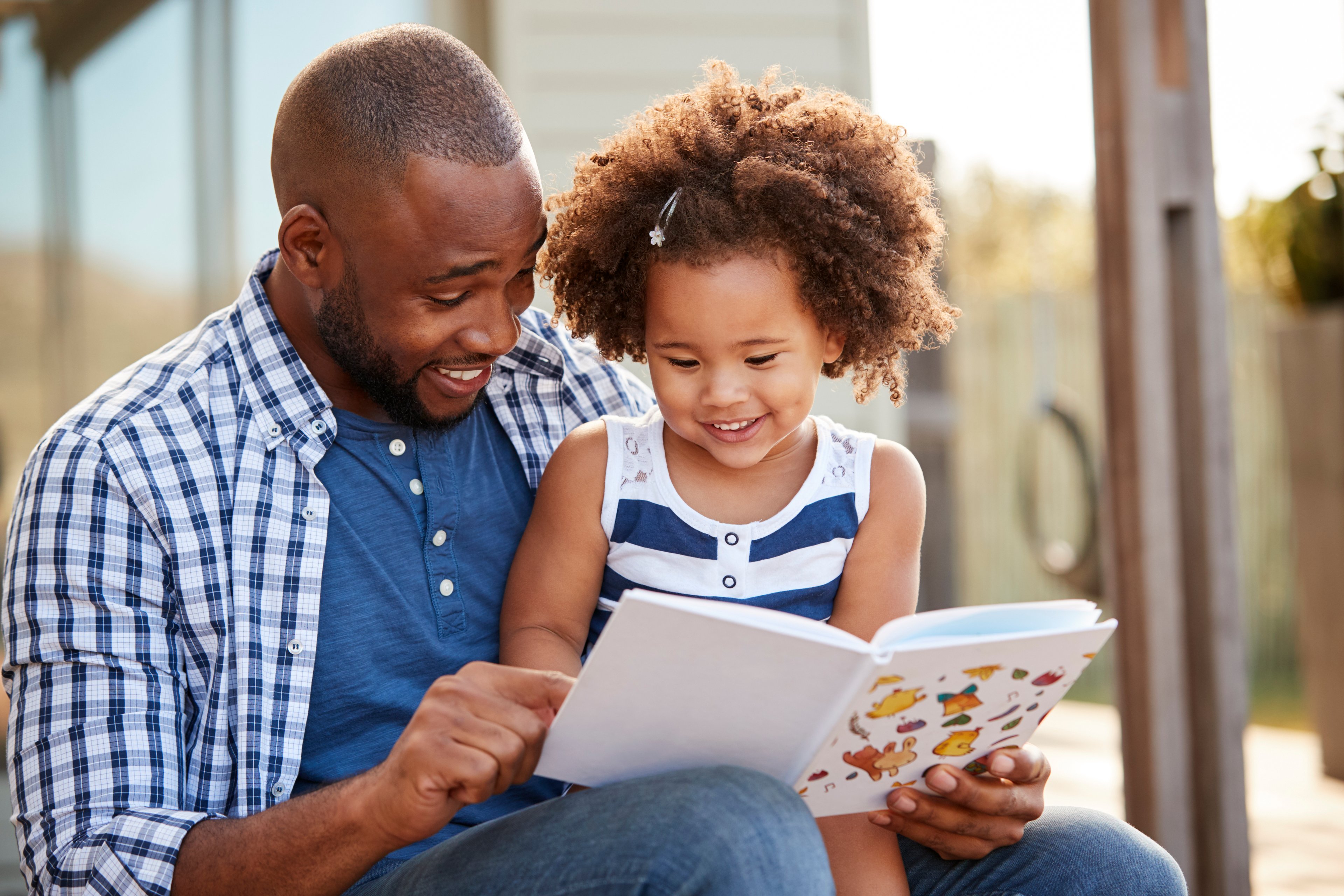 A family reading a book