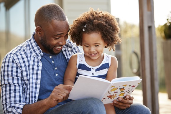 A family reading a book