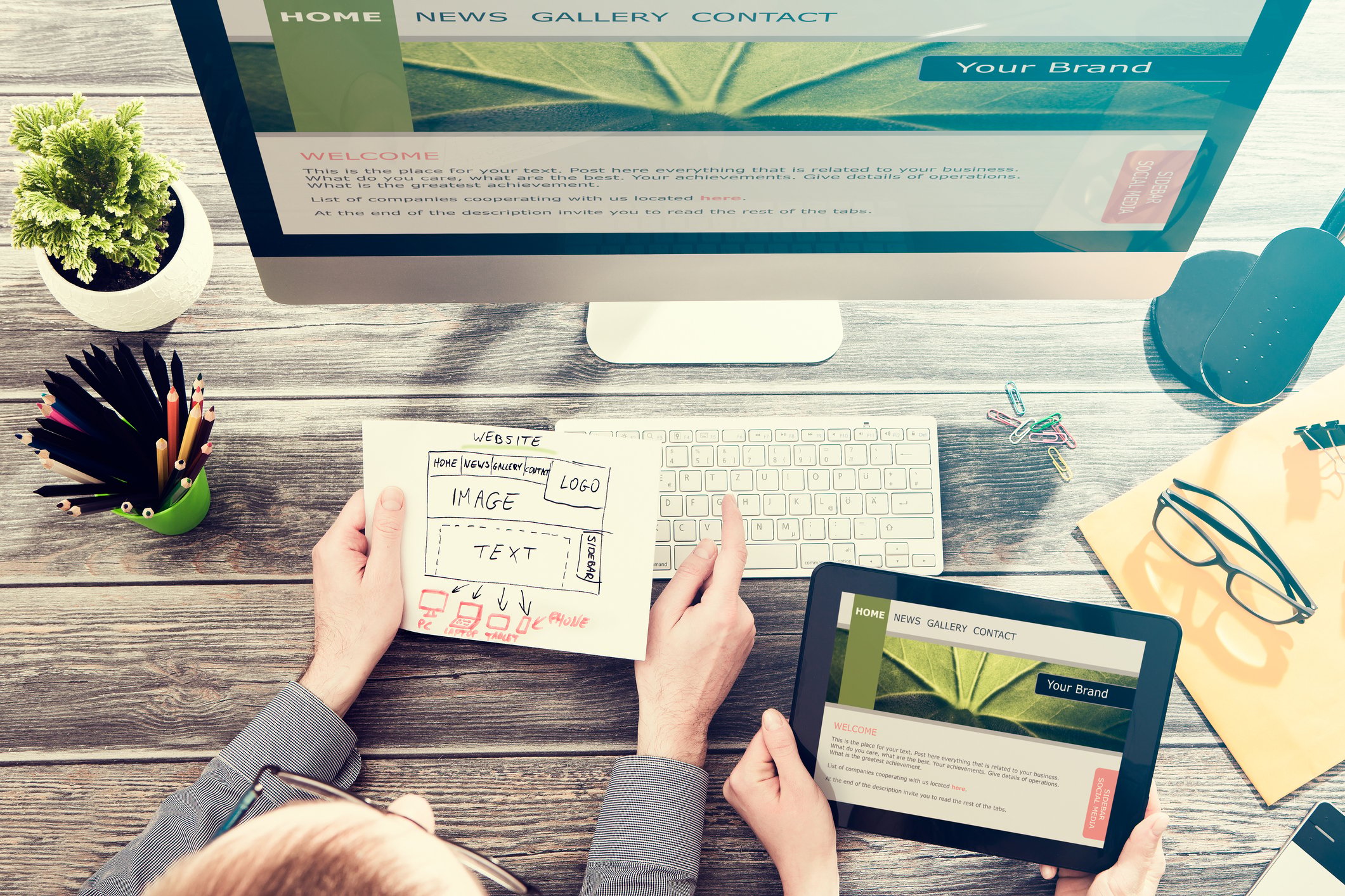People designing and building a website