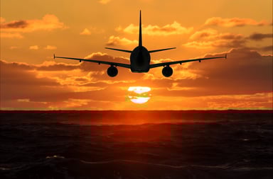 Plane - Sunset - GettyImages-628875016