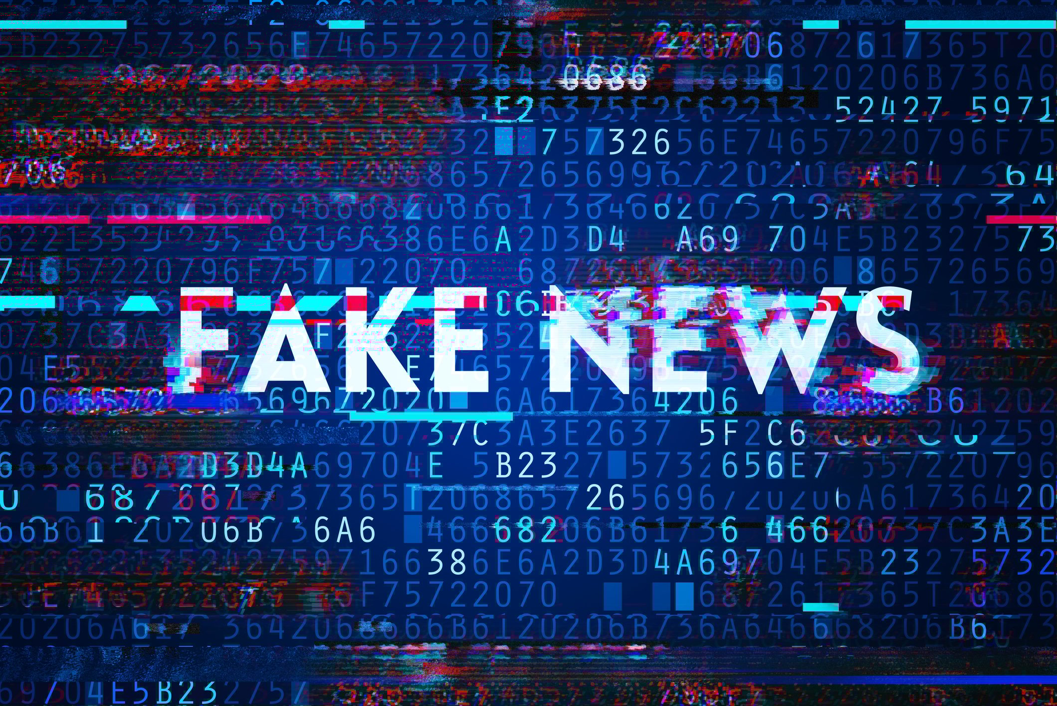 Fake news printed on a background made up of letters and numbers in various colors