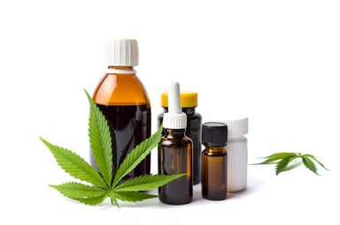 Marijuana leaf and bottles