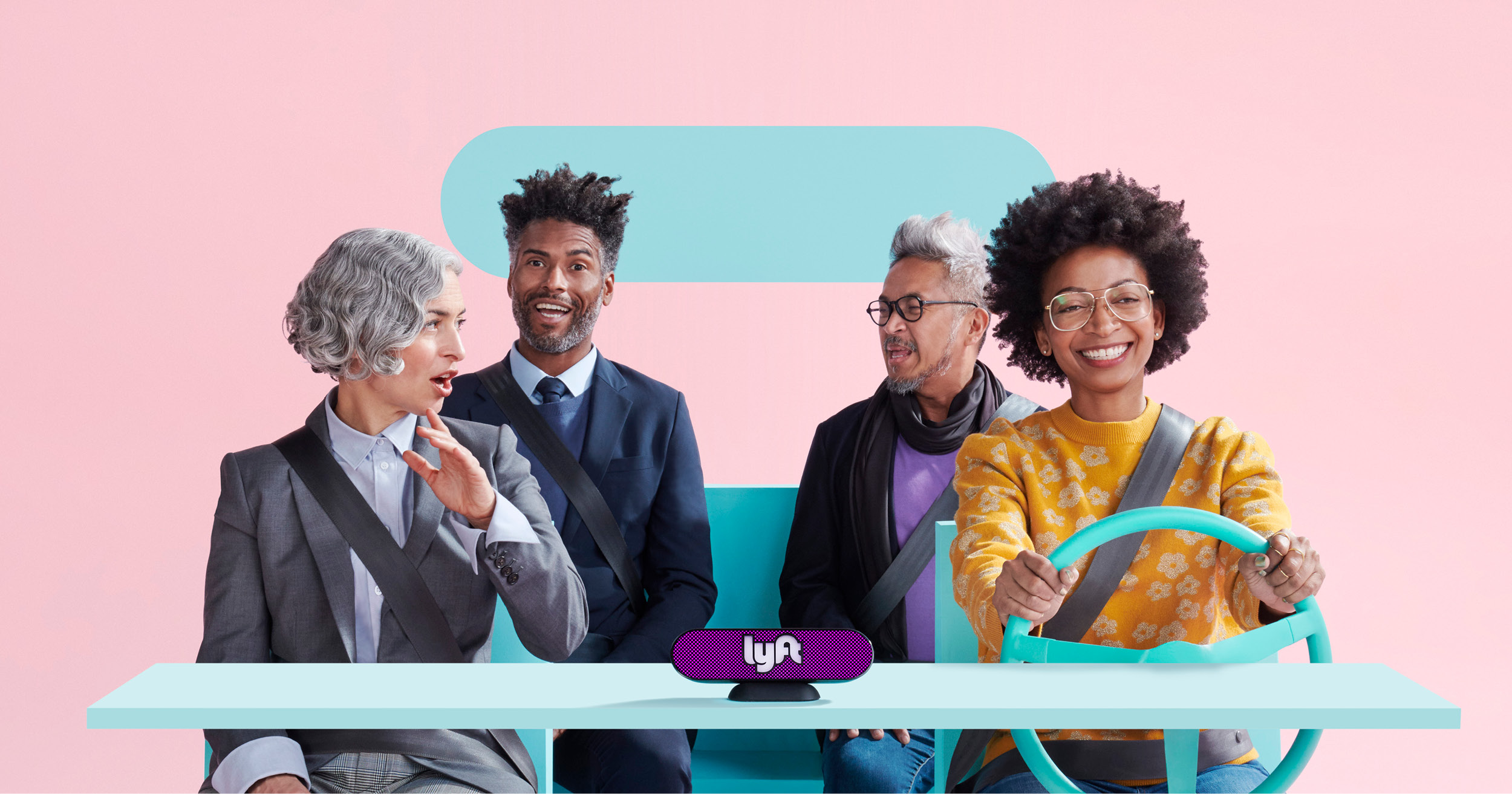 Four people in a make-believe Lyft vehicle.
