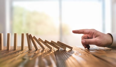 finger and falling dominos