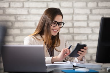 woman using calc_GettyImages-915448354