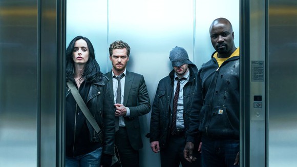 Marvel's Defenders cast on an elevator.