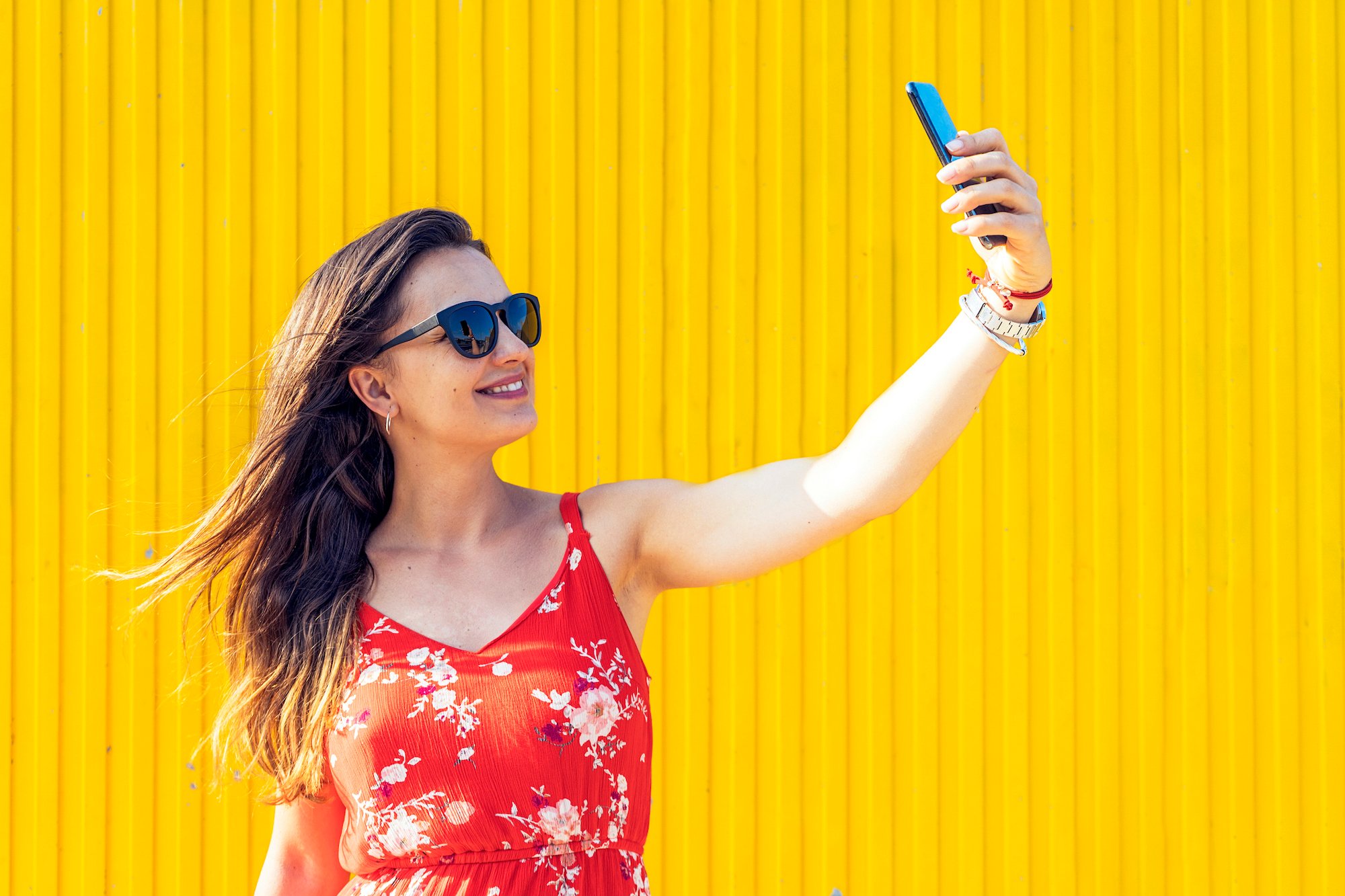 Woman taking a selfie.