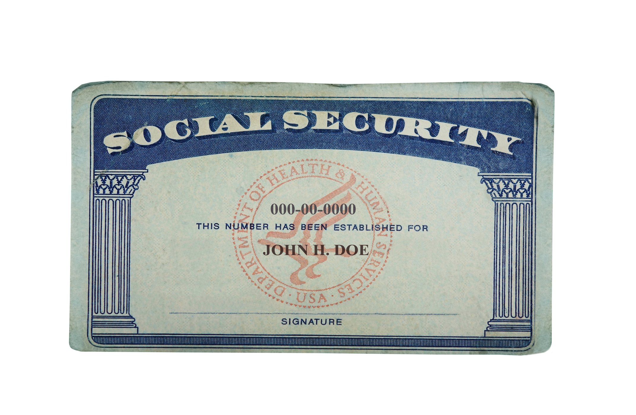 Social Security card on white background.