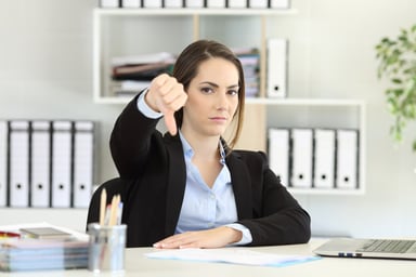woman with thumbs down_GettyImages-957422342