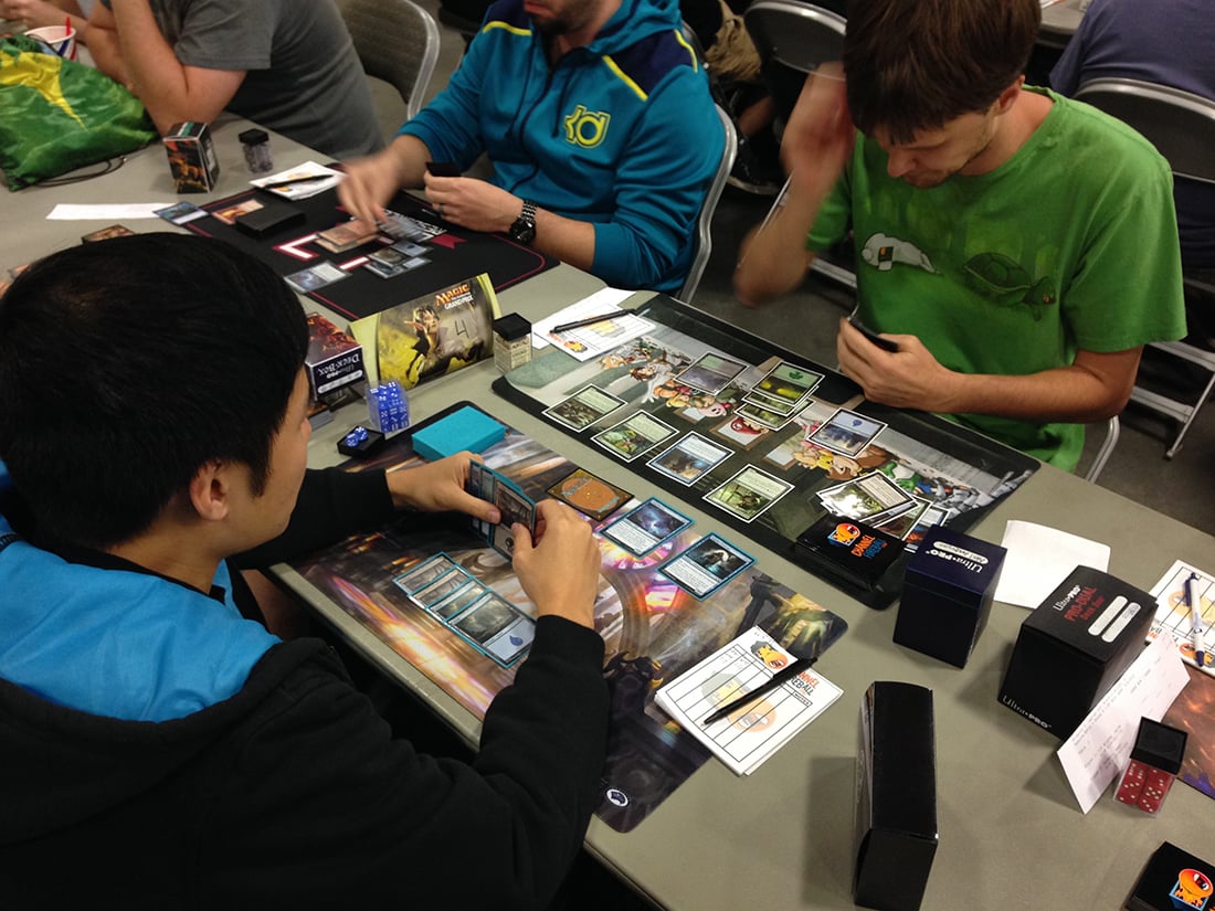 Action shot of Magic: The Gathering tournament