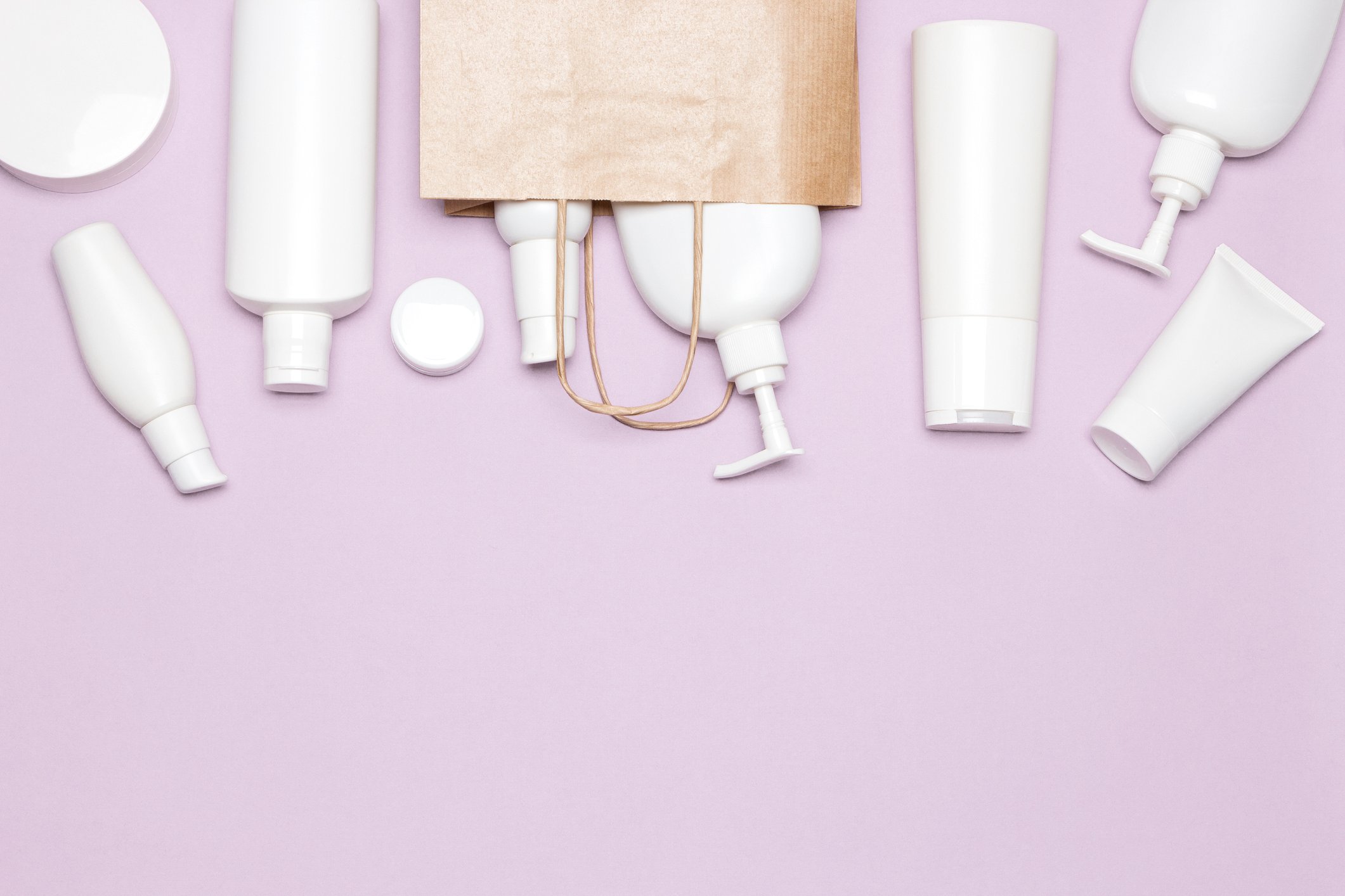 An assortment of skin-care products on a desk.
