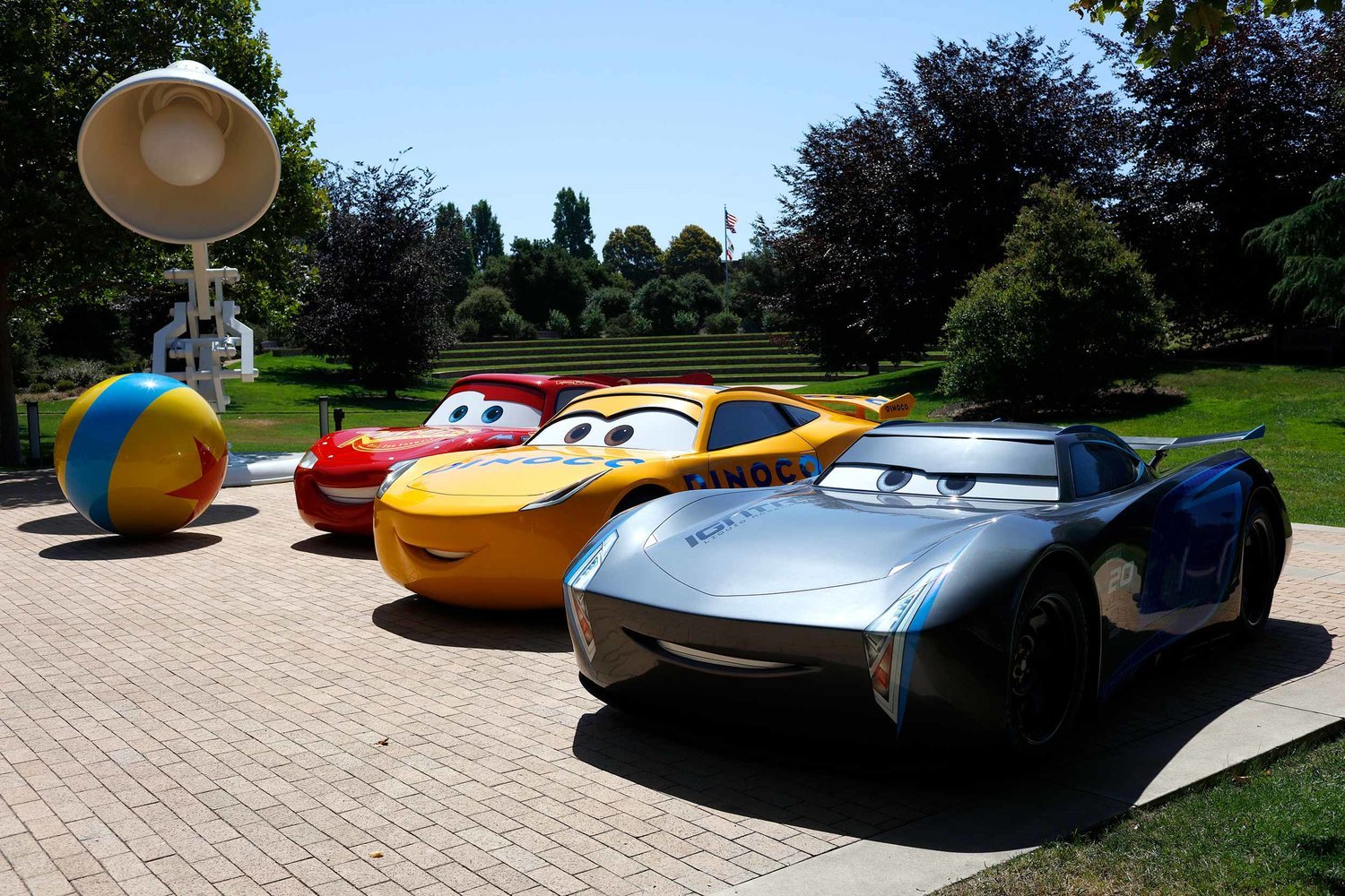 Life-size Cars and a giant Pixar lamp at Pixar Animation Studios.
