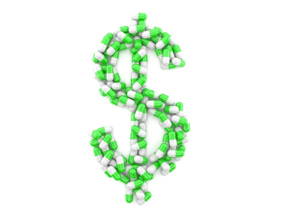 Pills forming a dollar sign.