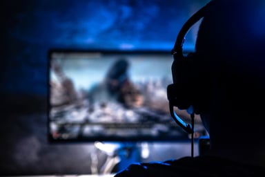 Person Playing Video Games With Headset On