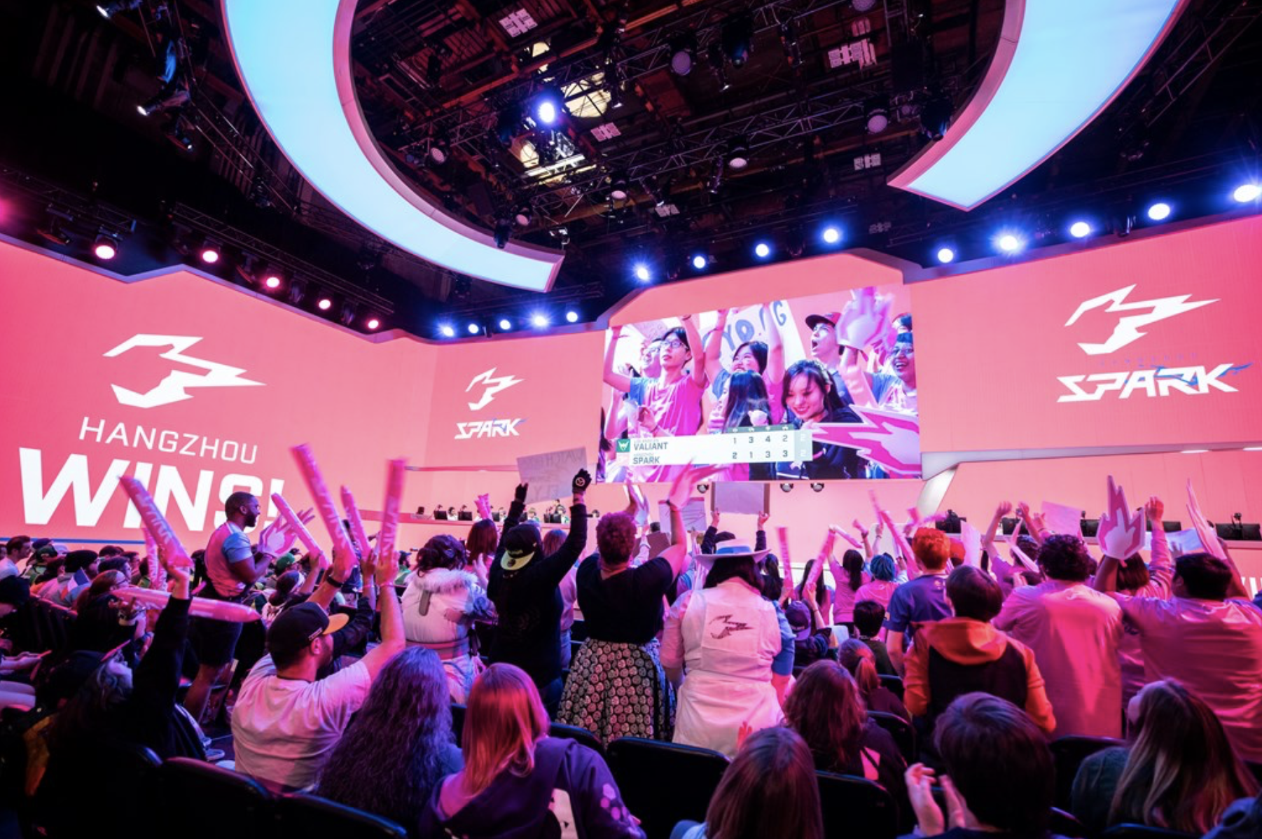 A crowd watching an Overwatch League esports match.