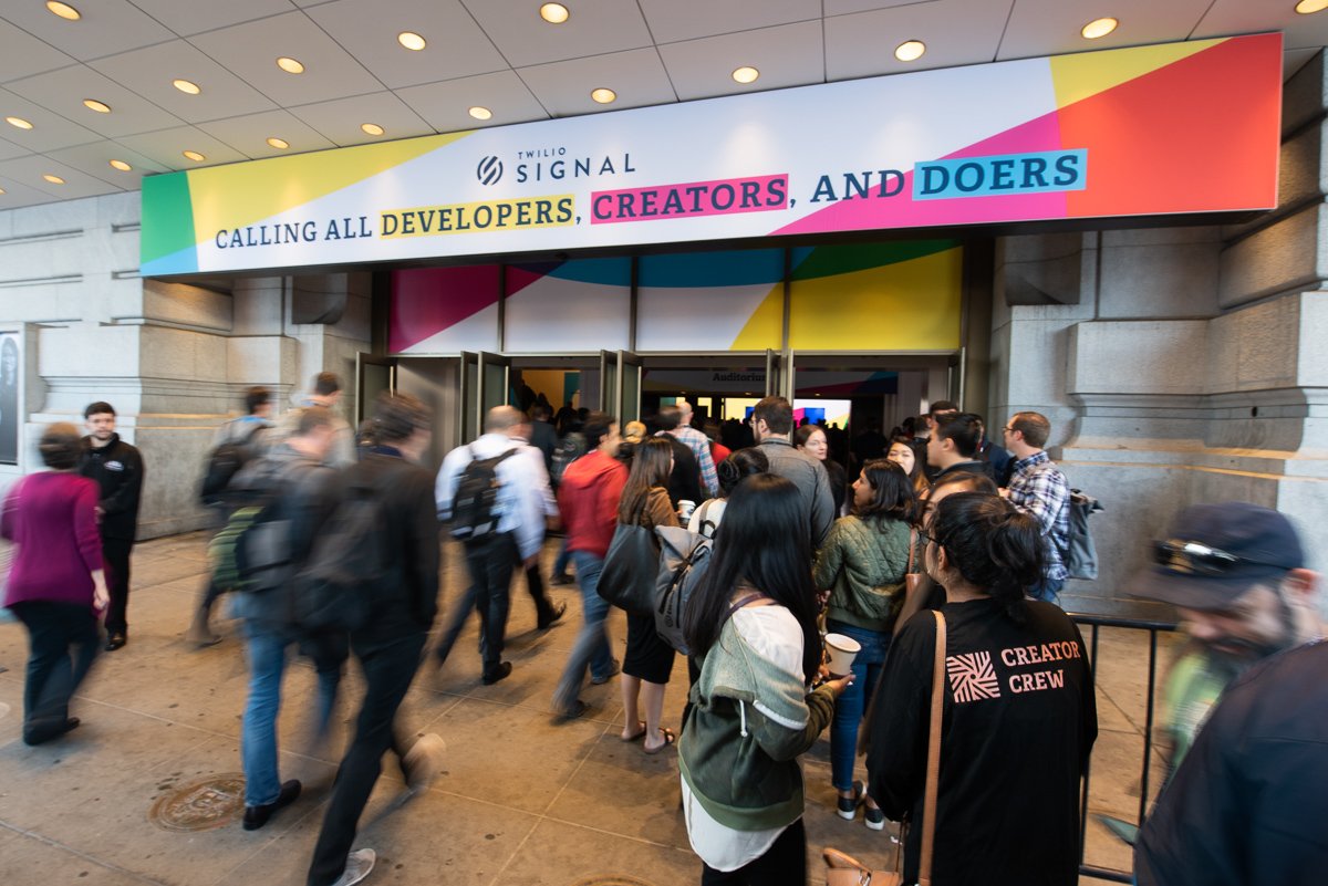 People entering the doors to the show floor for Signal 2019, Twilio's annual developer conference.