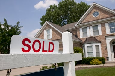 House with a sold sign