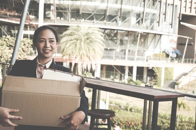 smiling woman quitting_GettyImages-920143458