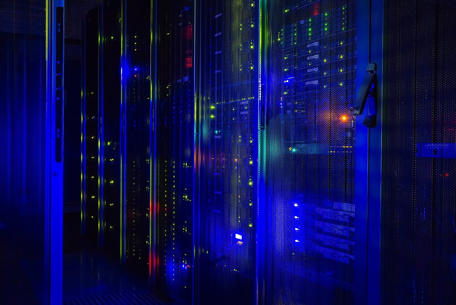 Data center mainframe with blue lighting.