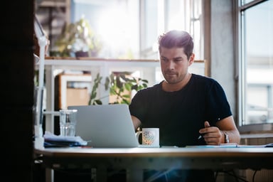 serious man at laptop_GettyImages-625726706
