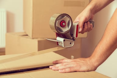 man packing up boxes_GettyImages-494765544