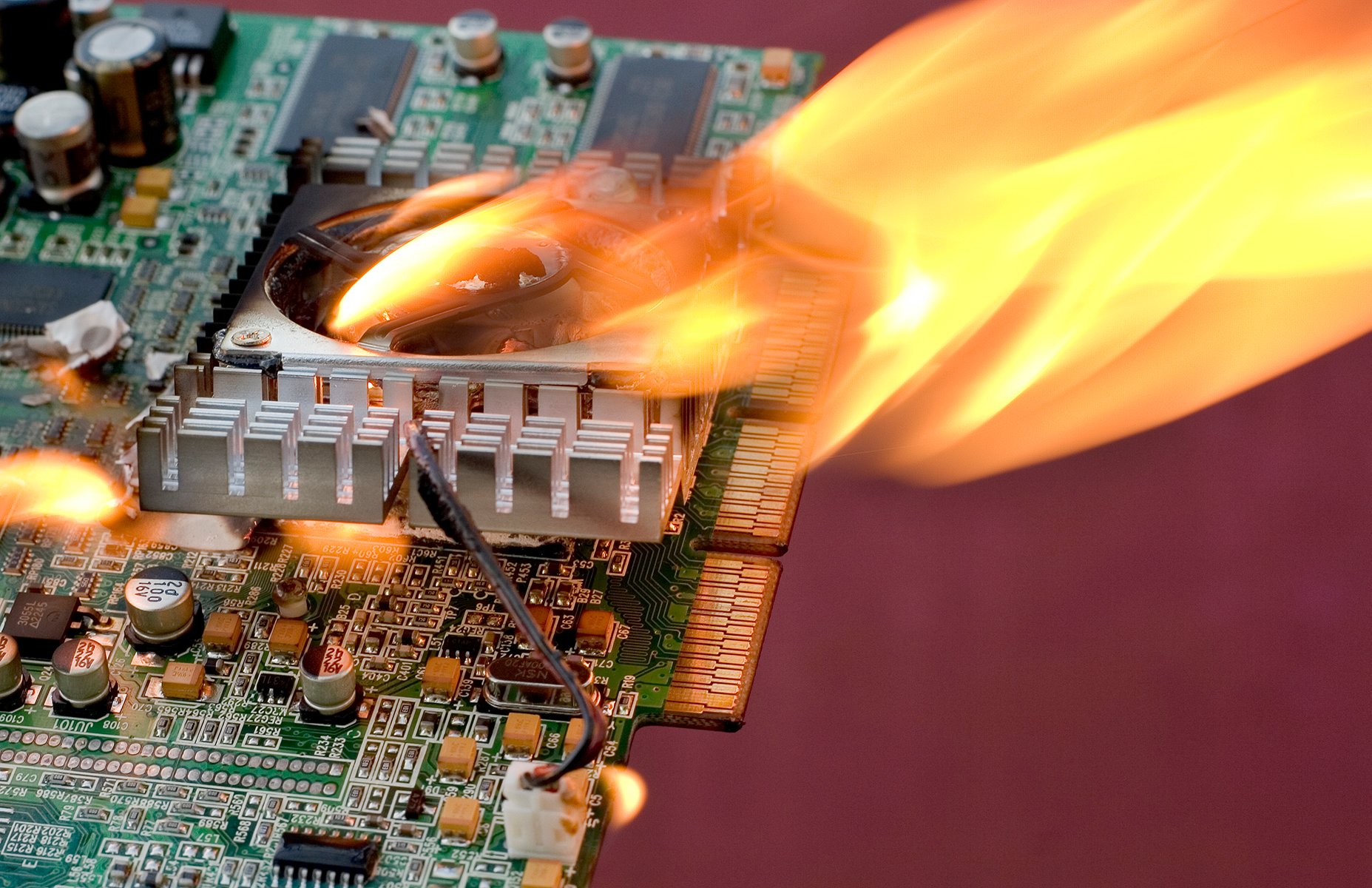 Close-up of a circuit board on fire