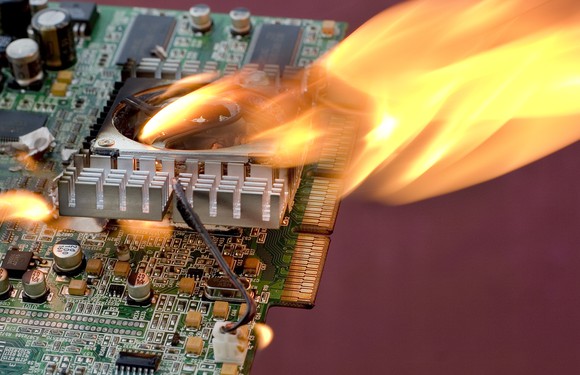 Close-up of a circuit board on fire