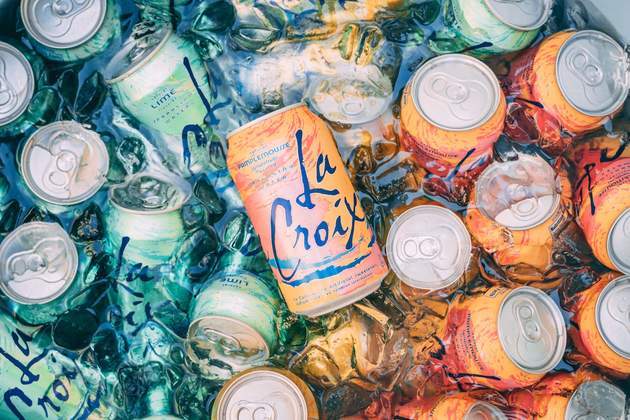 Twenty or so cans of La Croix in an ice-water bath