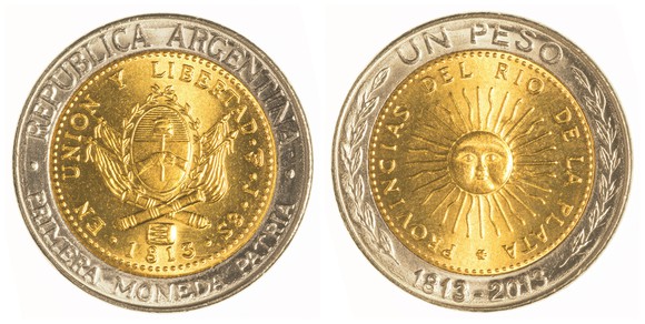 Head and tail sides of an Argentinean peso.