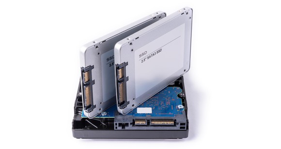 Two SSDs on top of a traditional HDD.