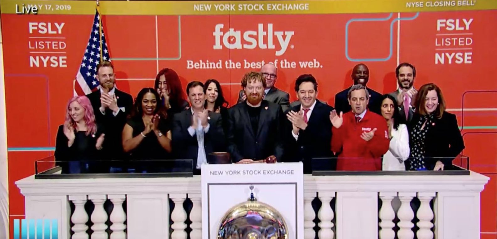 The Fastly team on stage at the New York Stock Exchange, preparing to rung the opening bell.
