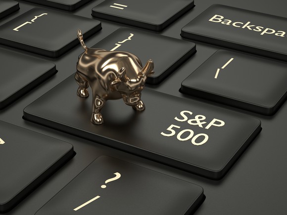 A miniature bull on top of the return key on a keyboard that says S and P 500.