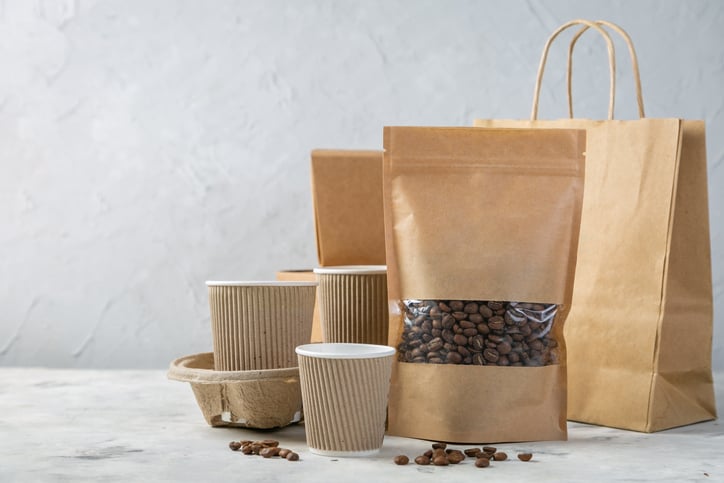 Various brown paper-based bags, cups, and containers.